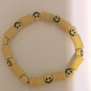 Yellow smiley face bracelet
